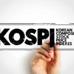 Samsung, Hynix Drag Markets Off Cliff Person checking stock market graphs on phone and monitors.