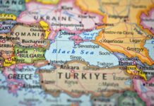 Black Sea Inferno Tests NATO Nerves Aerial view of multiple naval ships operating in the ocean