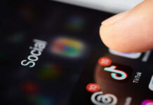 Phone screen with TikTok app and notifications