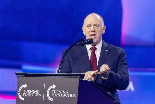tom-homan2568714697 Person speaking at Turning Point USA event podium