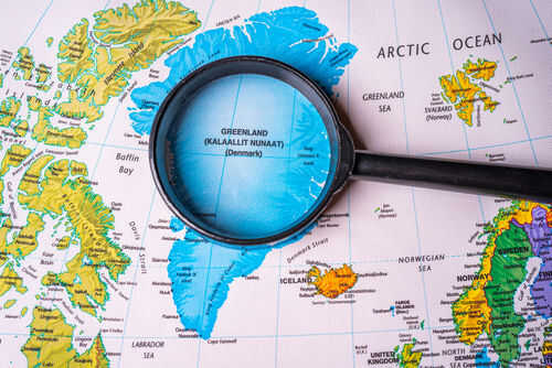 greenland-map2006866205jpg Magnifying glass over map of Greenland and Arctic Ocean