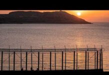 Hundreds of migrants swim from Morocco to the Spanish territory of Ceuta