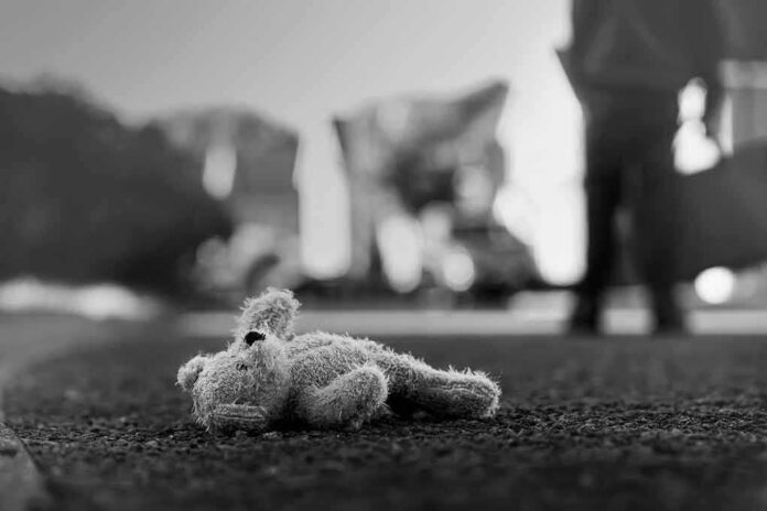 shutterstock_1173129871 Stuffed toy lying on pavement in black and white