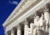 Supreme Court building facade with statue and columns
