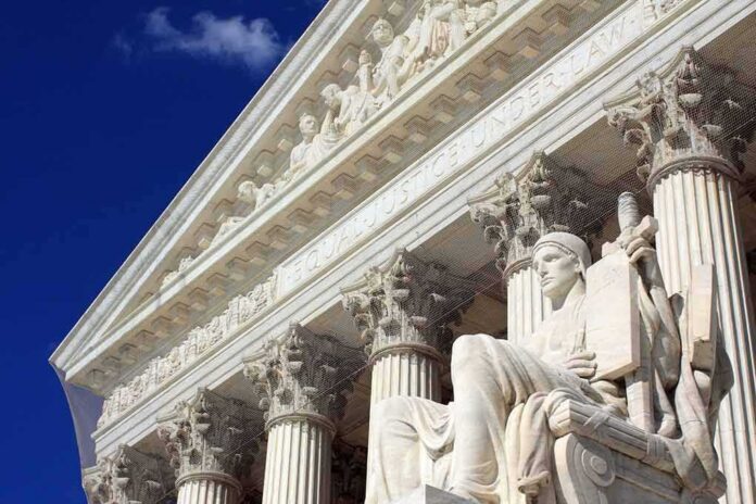 Supreme Court building facade with statue and columns