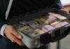 Professor Praises Killing—Cash Jackpot Follows James R Browning United States Courthouse entrance architecture