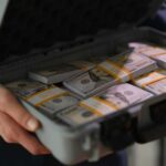 Professor Praises Killing—Cash Jackpot Follows James R Browning United States Courthouse entrance architecture