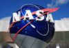 China Inches Closer — NASA Warns MONTHS Left NASA logo displayed on a large globe structure