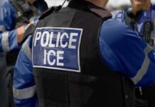 Missing Video Ignites Houston ICE Firestorm Close-up of a police officer's vest with 'POLICE ICE' label