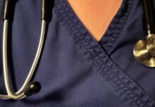 Nurse TikToks Ignite Healthcare Firestorm Stethoscope, pills, and Delayed Diagnosis booklet on table.