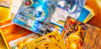 Pokemon trading cards scattered on a table