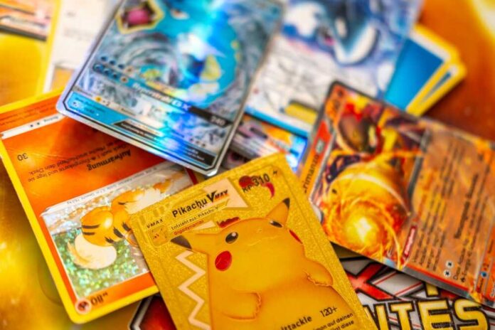 Pokemon trading cards scattered on a table