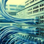 Network switches with blue Ethernet cables