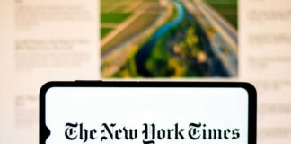 Smartphone displaying The New York Times logo