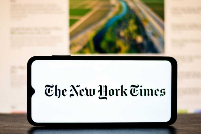 the-new-york-times-logo-on-a-mobile-screen2417493315jpg Smartphone displaying The New York Times logo