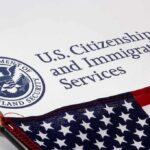 Border Showdown Over Vanishing Phone Data U.S. Citizenship and Immigration Services document with American flag
