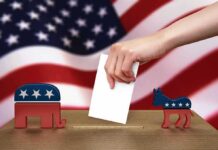 Court Whiplash Sets Up Ballot Chaos Hand casting ballot between Republican elephant and Democratic donkey