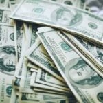 Wealth Tax Backfires? Cuban Sounds Alarm Stacks of U.S. hundred-dollar bills