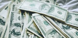 Stacks of U.S. hundred-dollar bills