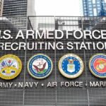 Military Recruiting Boom—What’s Really Driving It? U.S. Armed Forces recruiting station facade with service emblems