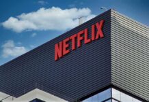 Netflix logo on modern office building exterior