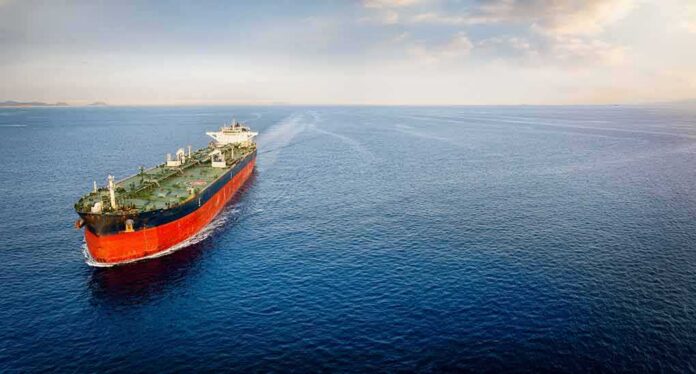 shutterstock_2330774137 Oil tanker sailing on calm open sea