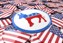 Hogg Torches Moderates—Big Tent Collapsing? Democratic donkey symbol on a campaign button