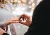 Bishop Drops Hammer On Gay Union Rites Close-up of a wedding ring being placed on a bride's finger