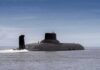 Submarine cruising on calm sea