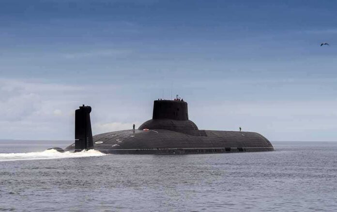 shutterstock_647634085-1 Submarine cruising on calm sea