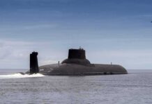 Submarine cruising on calm sea