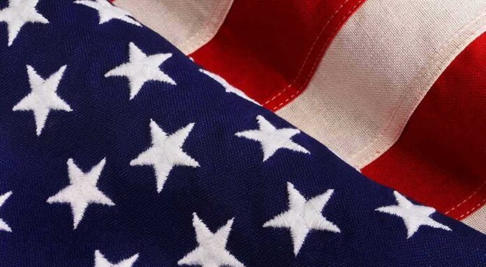 shutterstock_103457537 American flag close-up with stars and stripes