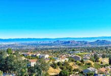 LA Earthquake Swarm – More Than 90! What’s Brewing Underground? Suburban neighborhood with mountains in the distance