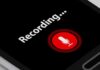 Punish Dissent? Leaked Audio Sparks Democrat Meltdown smartphone screen showing a red microphone recording button