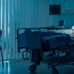 Beloved Headliner Down – MGM Responds hospital room with child in bed and adult sitting nearby