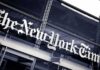 NYT Board Under Fire – What’s Hiding Inside? The New York Times sign on a glass building facade