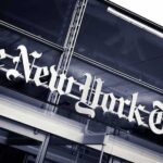NYT Board Under Fire – What’s Hiding Inside? The New York Times sign on a glass building facade