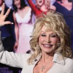 Dolly Parton waving at an event