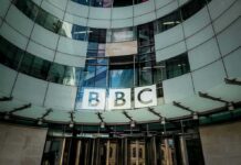 Hamas Link Hidden – Regulator SLAMS BBC BBC headquarters entrance with curved glass facade