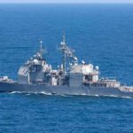 Trump Draws BLOOD-RED Line On Iran Gray naval warship cruising on open sea