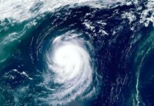 Slow-Moving Beast – Big Island Braces For Catastrophe Satellite view of a powerful hurricane swirling over the ocean