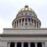 Cuba on Edge: CIA Delivers Stark Warning Capitol building dome with columns and a flag