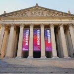 Patriotism Out? Museum’s Risky Rebrand Neoclassical museum facade with tall columns and wide stone steps