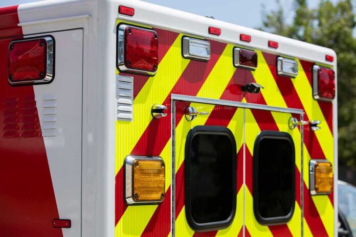 shutterstock_2165835301 Rear of an ambulance with chevron stripes and lights