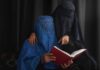 Washington’s ‘Moderate Islam’ Obsession Backfires Two veiled women reading a red book together