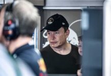 Musk Circle Turbocharges MDMA Rollout man in black cap looks ahead indoors