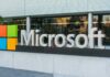 Regulators Hammer Microsoft’s Diesel Binge Microsoft logo displayed outside a modern office building