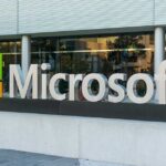Regulators Hammer Microsoft’s Diesel Binge Microsoft logo displayed outside a modern office building