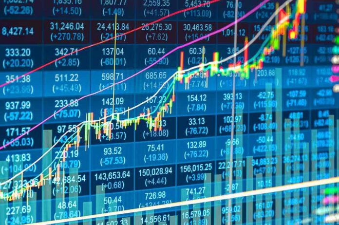 shutterstock_413551816-1 Stock market chart with rising candlesticks and trend lines
