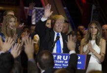 Donald Trump speaks at a rally with Ivanka Trump and Melania Trump on stage; Karlie Kloss in the crowd